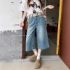 Real shot of American retro high street denim trousers for women in summer high waist ripped wide-leg trousers